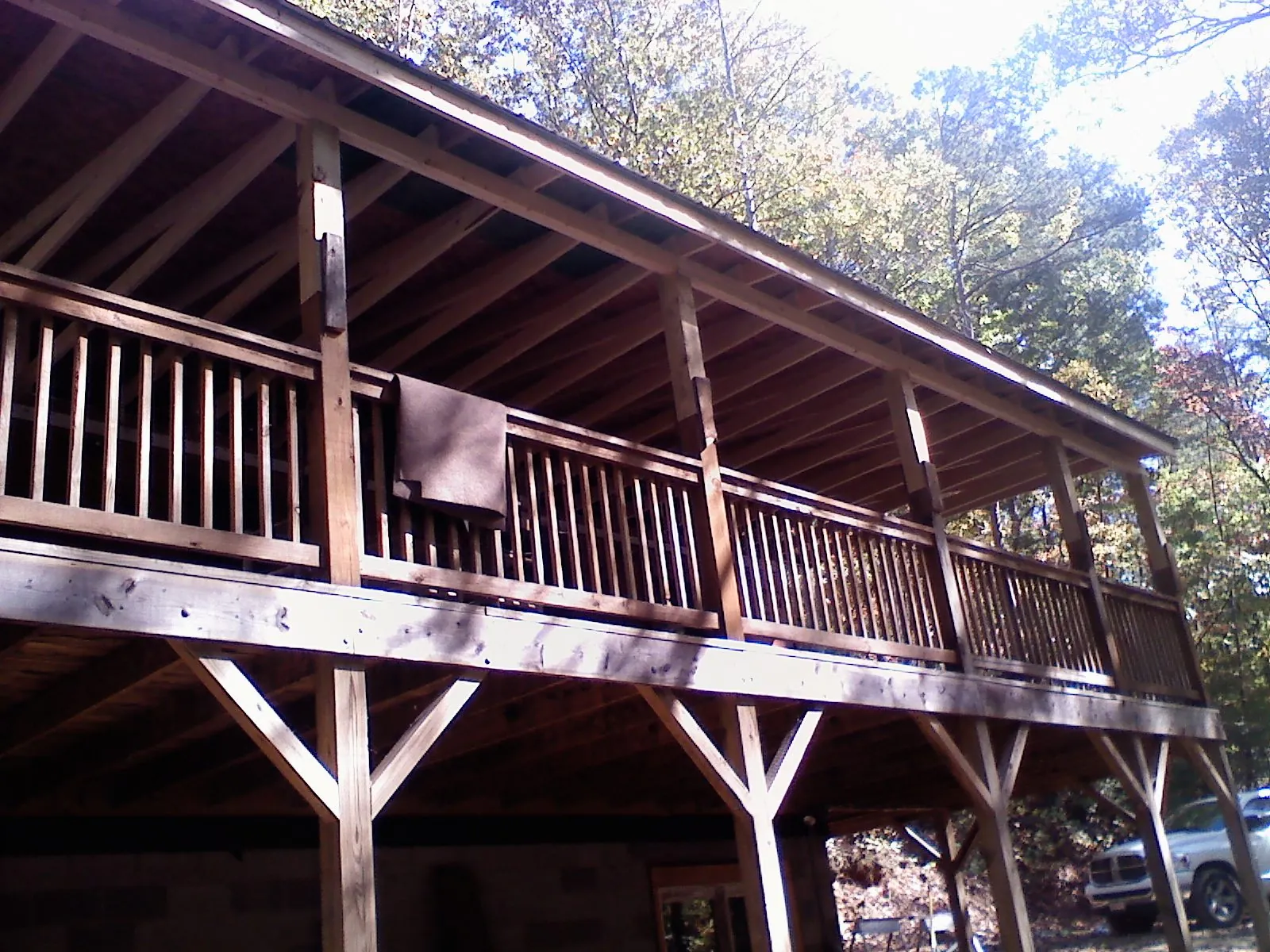 Timber framing under a new elevated porch and deck — Roof Leak Repair in Harpers Ferry by Roofing Brothers